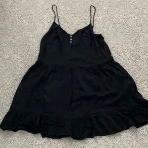 Black Sleeveless Dress with Button Detail